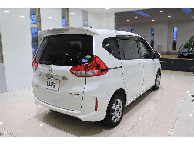フリードハイブリッド ハイブリッド・Ｇホンダセンシング　ナビ　バックカメラ　ＥＴＣ　横滑り防止装置　両側パワースライドドア　ＬＥＤヘッドライト　フォグライト　シートヒーター　センターテーブル　スマートキー　ウオークスルー　４ＷＤ　３列シート６人乗り（6枚目）
