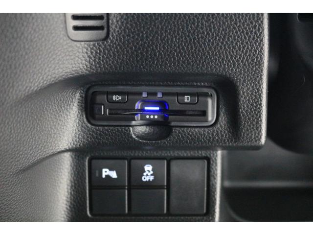N-BOXカスタム L ホンダセンシング 障害物センサー 横滑り防止装置 ナビ バックカメラ ETC 充電用USBジャック シートヒーター パワースライドドア シートバックテーブル アルミホイール スマートキー(28枚目)