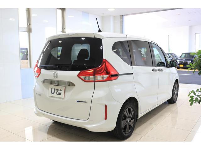 フリードハイブリッド ハイブリッド・Gブラックスタイル ディスプレイオーディオ バックカメラ ETC 横滑り防止装置 LEDヘッドライト シートヒーター パワースライドドア クルーズコントロール アルミホイール スマートキー 3列シート6人乗り(7枚目)