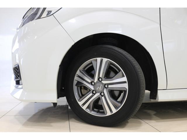 ステップワゴンスパーダ ｅ：ＨＥＶスパーダＧ・ＥＸホンダセンシング　ナビ　後席モニター　バックカメラ　ＥＴＣ　ドライブレコーダー　充電用ＵＳＢジャック　わくわくゲート　シートヒーター　シートバックテーブル　クルーズコントロール　アルミホイール　３列シート７人乗り（10枚目）