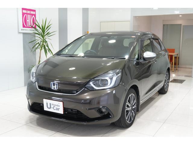 フィット ｅ：ＨＥＶリュクス　ホンダセンシング　横滑り防止装置　障害物センサー　ドライブレコーダー　ナビ　バックカメラ　ＥＴＣ　ワイヤレス充電器　ＬＥＤヘッドライト　ステアリングヒーター　アルミホイール　スマートキー（5枚目）