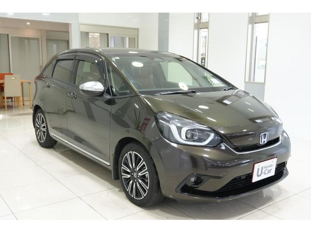 フィット ｅ：ＨＥＶリュクス　ホンダセンシング　横滑り防止装置　障害物センサー　ドライブレコーダー　ナビ　バックカメラ　ＥＴＣ　ワイヤレス充電器　ＬＥＤヘッドライト　ステアリングヒーター　アルミホイール　スマートキー（9枚目）