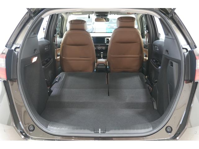 フィット ｅ：ＨＥＶリュクス　ホンダセンシング　横滑り防止装置　障害物センサー　ドライブレコーダー　ナビ　バックカメラ　ＥＴＣ　ワイヤレス充電器　ＬＥＤヘッドライト　ステアリングヒーター　アルミホイール　スマートキー（16枚目）