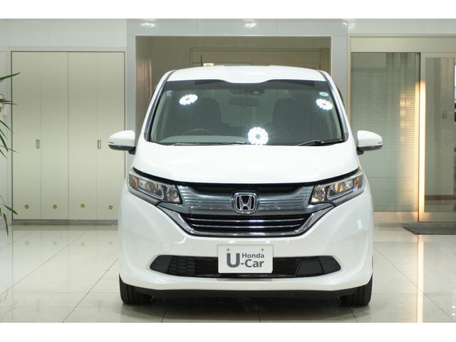 フリードハイブリッド ハイブリッド・EX Sパッケージ ホンダセンシング 横滑り防止装置 ホンダインターナビ ETC 充電用USBジャック LEDヘッドライト シートヒーター パワースライドドア クルーズコントロール アルミホイール 6人乗り(3枚目)