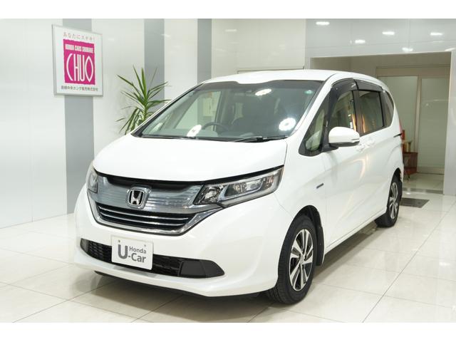 フリードハイブリッド ハイブリッド・EX Sパッケージ ホンダセンシング 横滑り防止装置 ホンダインターナビ ETC 充電用USBジャック LEDヘッドライト シートヒーター パワースライドドア クルーズコントロール アルミホイール 6人乗り(4枚目)