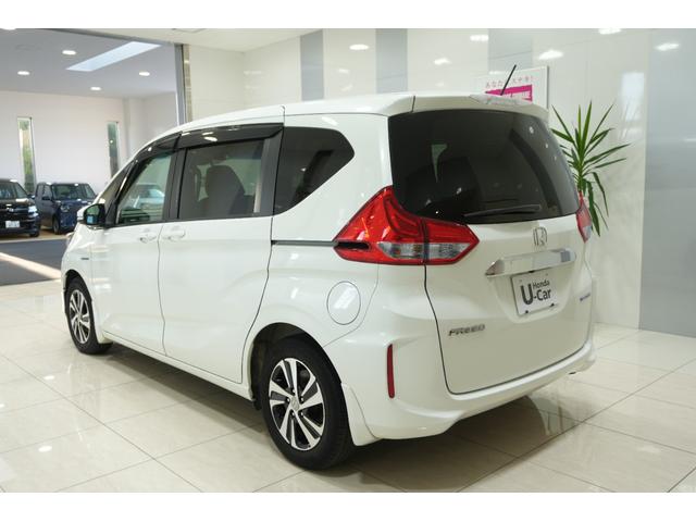 フリードハイブリッド ハイブリッド・EX Sパッケージ ホンダセンシング 横滑り防止装置 ホンダインターナビ ETC 充電用USBジャック LEDヘッドライト シートヒーター パワースライドドア クルーズコントロール アルミホイール 6人乗り(5枚目)