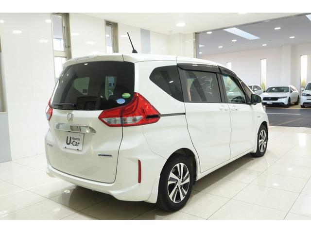 フリードハイブリッド ハイブリッド・EX Sパッケージ ホンダセンシング 横滑り防止装置 ホンダインターナビ ETC 充電用USBジャック LEDヘッドライト シートヒーター パワースライドドア クルーズコントロール アルミホイール 6人乗り(7枚目)