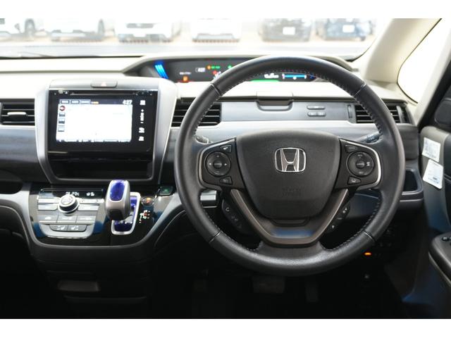 フリードハイブリッド ハイブリッド・EX Sパッケージ ホンダセンシング 横滑り防止装置 ホンダインターナビ ETC 充電用USBジャック LEDヘッドライト シートヒーター パワースライドドア クルーズコントロール アルミホイール 6人乗り(16枚目)