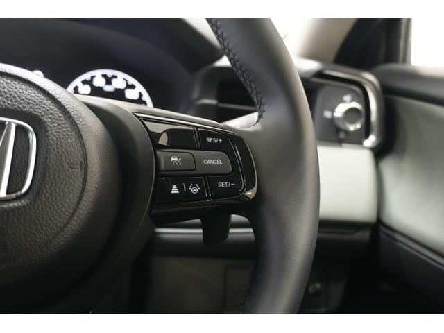 ヴェゼル ｅ：ＨＥＶＸ・ＨｕＮＴパッケージ　元試乗車　ホンダセンシング　障害物センサー　横滑り防止装置　ナビ　バックカメラ　本革巻ステアリング　ルーフレール　クルーズコントロール　アルミホイール　スマートキー（23枚目）