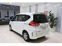 フリードハイブリッド ハイブリッド・Ｇホンダセンシング　ナビ　バックカメラ　ＥＴＣ　横滑り防止装置　両側パワースライドドア　ＬＥＤヘッドライト　フォグライト　シートヒーター　センターテーブル　スマートキー　ウオークスルー　４ＷＤ　３列シート６人乗り（5枚目）