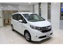 フリードハイブリッド ハイブリッド・Ｇホンダセンシング　ナビ　バックカメラ　ＥＴＣ　横滑り防止装置　両側パワースライドドア　ＬＥＤヘッドライト　フォグライト　シートヒーター　センターテーブル　スマートキー　ウオークスルー　４ＷＤ　３列シート６人乗り（7枚目）