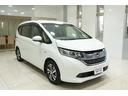 フリードハイブリッド ハイブリッド・EX Sパッケージ ホンダセンシング 横滑り防止装置 ホンダインターナビ ETC 充電用USBジャック LEDヘッドライト シートヒーター パワースライドドア クルーズコントロール アルミホイール 6人乗り(8枚目)