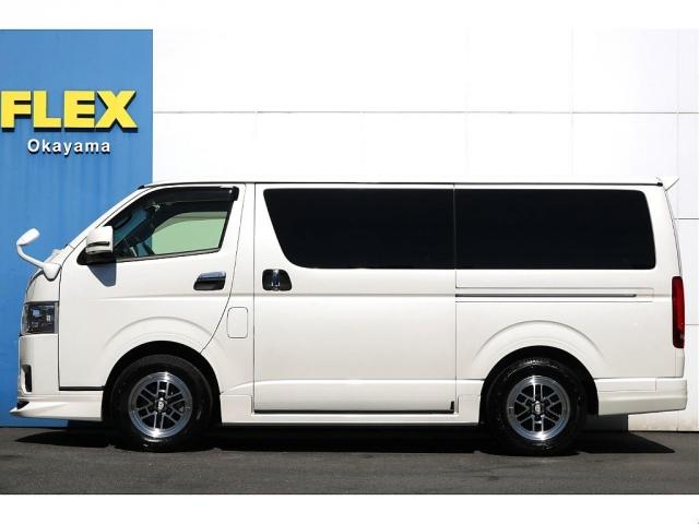 ハイエースバン スーパーＧＬ　ダークプライムＩＩ　Ｒ４年式　４ナンバー　ディーゼル４ＷＤ　モデリスタフルエアロ　ルーフスポイラー　オーバーフェンダー　ウインカーミラー　ＢＩＧＸ１１インチＳＤナビ　ＥＴＣ　レーダー探知機　シートカバー　ベッドキット（5枚目）