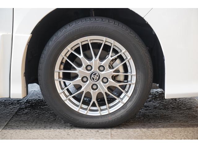 ヴォクシー ハイブリッドZS 煌II 純正10インチSDナビTV 12.1インチ後席モニター Clazzio製シートカバー クリアランスソナー LEDヘッドライト 純正16インチ鍛造ホイール 両側パワースライドドア シートヒーター ETC(73枚目)