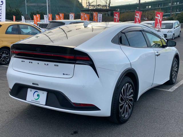 プリウス Ｘ　ワンオーナー　禁煙　モデリスタＡＷ　ナビ　フルセグ　Ｂｌｕｅｔｏｏｔｈ　バックモニター　前後ドラレコ　レーダークルーズ　ＥＴＣ　レーダー探知機　ＢＳＭ　ＡＣ１００Ｖ　レザー調シートカバー　オートＨＢ（4枚目）