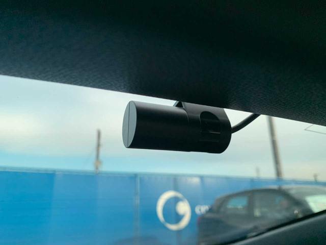 プリウス Ｘ　ワンオーナー　禁煙　モデリスタＡＷ　ナビ　フルセグ　Ｂｌｕｅｔｏｏｔｈ　バックモニター　前後ドラレコ　レーダークルーズ　ＥＴＣ　レーダー探知機　ＢＳＭ　ＡＣ１００Ｖ　レザー調シートカバー　オートＨＢ（9枚目）