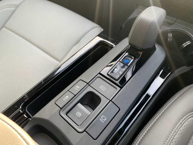 プリウス Ｘ　ワンオーナー　禁煙　モデリスタＡＷ　ナビ　フルセグ　Ｂｌｕｅｔｏｏｔｈ　バックモニター　前後ドラレコ　レーダークルーズ　ＥＴＣ　レーダー探知機　ＢＳＭ　ＡＣ１００Ｖ　レザー調シートカバー　オートＨＢ（23枚目）