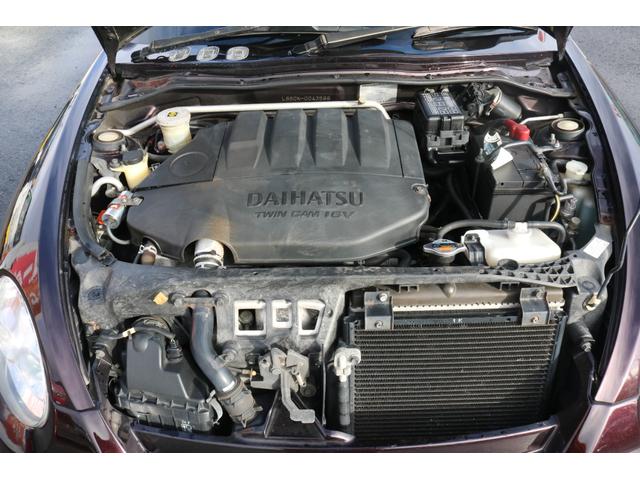 コペン アクティブトップ　電動ルーフ　４ＡＴ　ＭＴモード付　ターボ　ブーストメーター　ＥＣＵコントローラー　ＨＩＤヘッドライト　１４インチアルミホイール　外品エアロウィング　キーレス　ＳＤナビ　ワンセグＴＶ　ＣＤ再生　ＥＴＣ（5枚目）