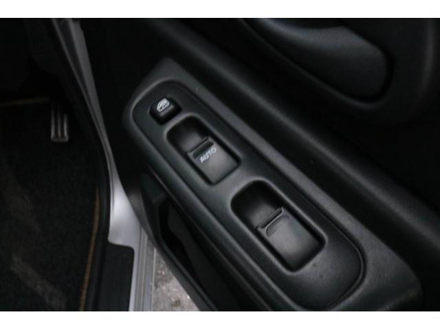 ジムニー ＸＣ　５ＭＴ　４ＷＤ　ターボ　キーレス　純正１６インチアルミホイール　エアコン　パワーウィンドウ　フォグランプ　車検整備付（12枚目）