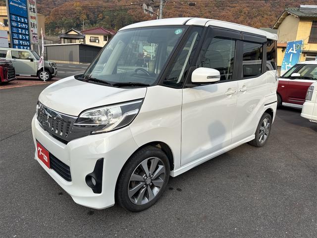 ｅＫスペースカスタム カスタムＴ　アラウンドビュー　ターボ　純正ナビ　両側電動スライドドア　純正アルミホイール　リアサーキュレーター　オートエアコン　オートライト　ＨＩＤヘッドライト　プッシュスタート　スマートキー　電動格納ミラー（7枚目）