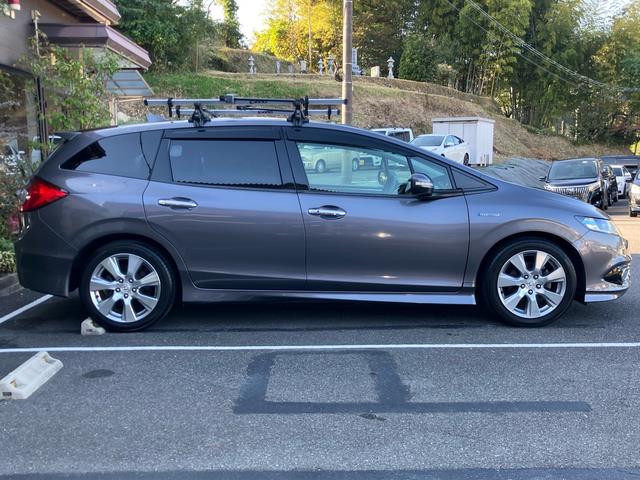 ジェイド ハイブリッドX フリップダウンモニター 3列シート チップアップシート ハーフレザーシート 前後ドライブレコーダー バックカメラ ルーフレール Bluetooth接続 スマートキー 電動格納ミラー(3枚目)