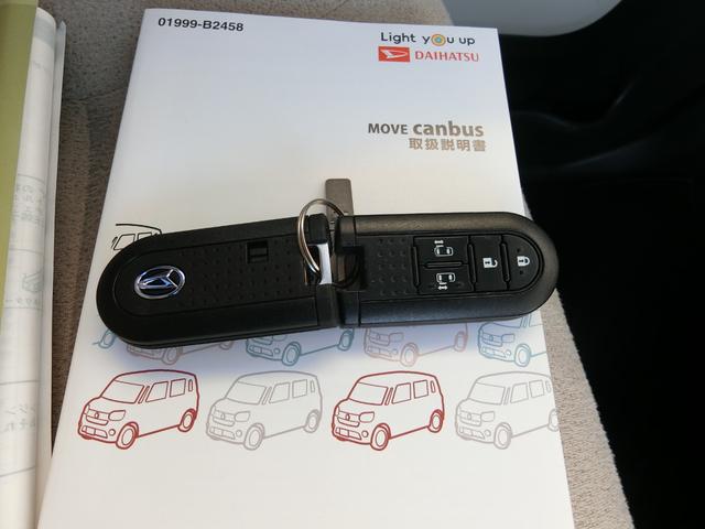 ムーヴキャンバス Ｘメイクアップリミテッド　ＳＡＩＩＩ　全周囲カメラ　ダイハツ純正ナビ　両側パワースライドドア　オートライト　ベンチシート　スマートキー　Ｂｌｕｅｔｏｏｔｈ接続　電動格納ミラー　エアバッグ　フルセグ　アイドリングストップ　記録簿　禁煙（20枚目）