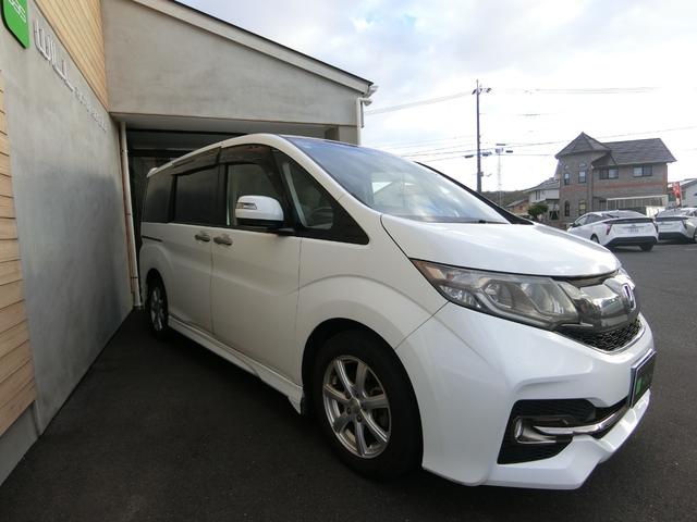 ステップワゴンスパーダ スパーダクールスピリット　アドバンスパッケージα　８人乗り　ターボ　純正ナビ　１６インチＡＷ　クルーズコントロール　両側パワースライドドア　リアわくわくゲート　リアエンターテインメントシステム　バックカメラ　ハーフレザー　シートヒーター　パドルシフト（12枚目）