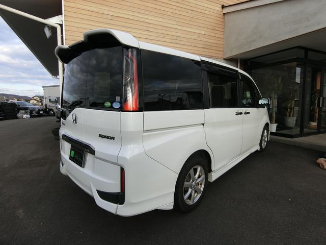 ステップワゴンスパーダ スパーダクールスピリット　アドバンスパッケージα　８人乗り　ターボ　純正ナビ　１６インチＡＷ　クルーズコントロール　両側パワースライドドア　リアわくわくゲート　リアエンターテインメントシステム　バックカメラ　ハーフレザー　シートヒーター　パドルシフト（14枚目）