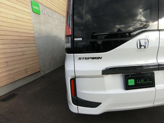 ステップワゴンスパーダ スパーダクールスピリット　アドバンスパッケージα　８人乗り　ターボ　純正ナビ　１６インチＡＷ　クルーズコントロール　両側パワースライドドア　リアわくわくゲート　リアエンターテインメントシステム　バックカメラ　ハーフレザー　シートヒーター　パドルシフト（63枚目）