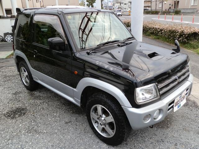 パジェロミニ アクティブフィールドエディション　４ＷＤ　ターボ　ナビＴＶ　禁煙車　キーレス　電動格納ミラー　リアスポイラー　フォグランプ　純正アルミホイール（8枚目）