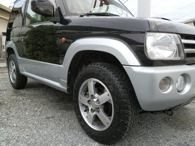 パジェロミニ アクティブフィールドエディション　４ＷＤ　ターボ　ナビＴＶ　禁煙車　キーレス　電動格納ミラー　リアスポイラー　フォグランプ　純正アルミホイール（62枚目）