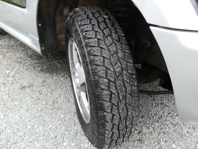 パジェロミニ アクティブフィールドエディション　４ＷＤ　ターボ　ナビＴＶ　禁煙車　キーレス　電動格納ミラー　リアスポイラー　フォグランプ　純正アルミホイール（65枚目）