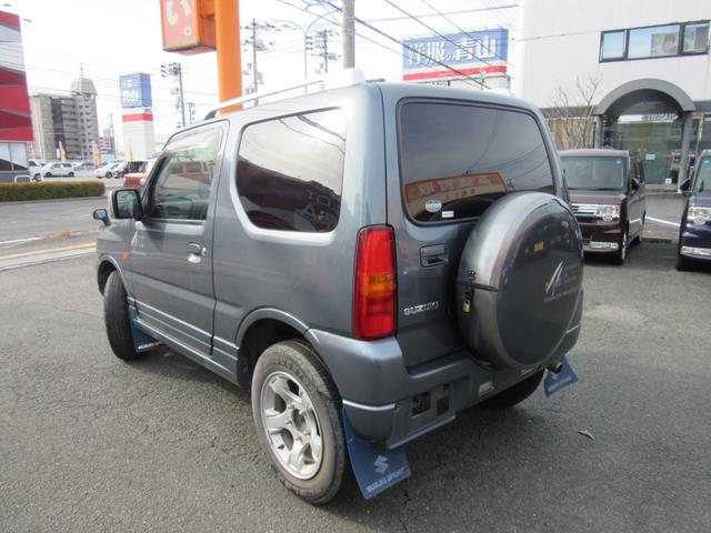 ジムニー ＦＩＳフリースタイルワールドカップリミテッド　切替４ＷＤ／ターボ／社外ＳＤナビ／地デジＴＶ／キーレス／背面ハードカバー／シートヒーター／ウインカー付きドアミラー／修復歴無（4枚目）