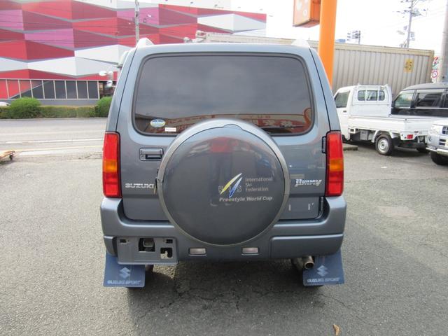 ジムニー ＦＩＳフリースタイルワールドカップリミテッド　切替４ＷＤ／ターボ／社外ＳＤナビ／地デジＴＶ／キーレス／背面ハードカバー／シートヒーター／ウインカー付きドアミラー／修復歴無（5枚目）