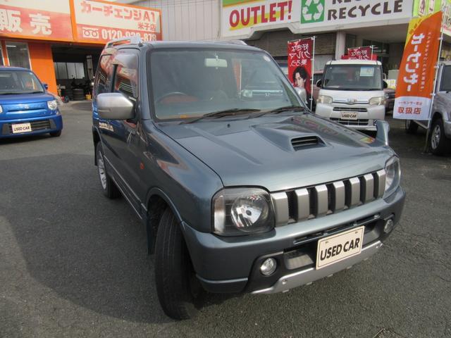 ジムニー ＦＩＳフリースタイルワールドカップリミテッド　切替４ＷＤ／ターボ／社外ＳＤナビ／地デジＴＶ／キーレス／背面ハードカバー／シートヒーター／ウインカー付きドアミラー／修復歴無（8枚目）