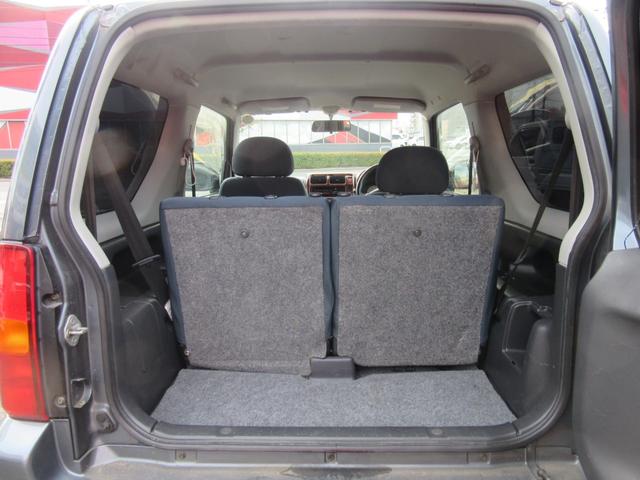 ジムニー ＦＩＳフリースタイルワールドカップリミテッド　切替４ＷＤ／ターボ／社外ＳＤナビ／地デジＴＶ／キーレス／背面ハードカバー／シートヒーター／ウインカー付きドアミラー／修復歴無（14枚目）