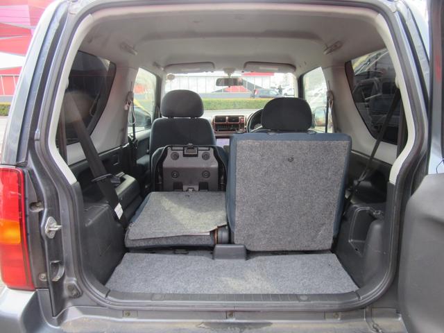 ジムニー ＦＩＳフリースタイルワールドカップリミテッド　切替４ＷＤ／ターボ／社外ＳＤナビ／地デジＴＶ／キーレス／背面ハードカバー／シートヒーター／ウインカー付きドアミラー／修復歴無（15枚目）