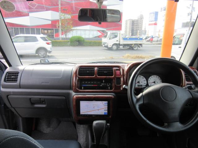 ジムニー ＦＩＳフリースタイルワールドカップリミテッド　切替４ＷＤ／ターボ／社外ＳＤナビ／地デジＴＶ／キーレス／背面ハードカバー／シートヒーター／ウインカー付きドアミラー／修復歴無（18枚目）