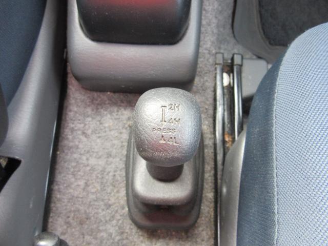 ジムニー ＦＩＳフリースタイルワールドカップリミテッド　切替４ＷＤ／ターボ／社外ＳＤナビ／地デジＴＶ／キーレス／背面ハードカバー／シートヒーター／ウインカー付きドアミラー／修復歴無（23枚目）