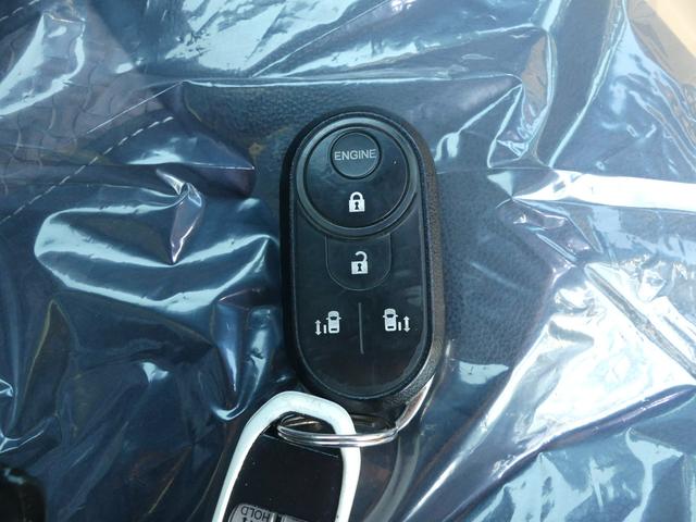 Ｎ－ＢＯＸカスタム Ｇ・Ｌターボホンダセンシング　ＶＸＵ－１８５ＮＢｉ、ナビスペシャルパッケージ、ＥＴＣ、オートリトラミラー、アレルクリーンプラスシート、リア両側パワースライドドア、サイドエアバック・サイドカーテンエアバック、１５インチアルミホイール（19枚目）