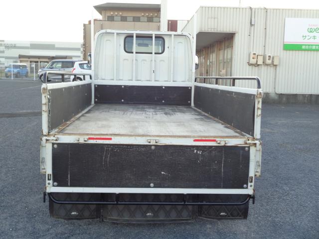 キャンター 　平ボディ　オートマチック　ディーゼルターボ　パワステ　パワーウィンドウ　左側電格ミラー　ラジオ　ＣＤ　ＤＶＤ　ＴＶ　ナビ　ＥＴＣ　キーレス　積載量１．５ｔ（10枚目）