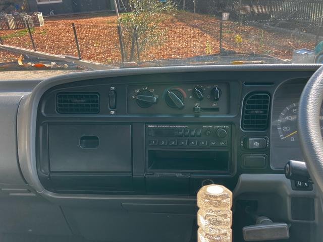 キャンター 　５速ＭＴ　ユニック　４段ムーブ　アーム付き　リモコン付き　ＥＴＣ　ＡＭ／ＦＭラジオ　エアコン　パワーウィンドウ（48枚目）