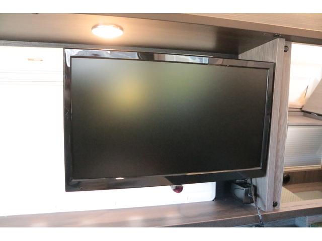 ハイエースバン キャンパー鹿児島 ボス ツインサブバッテリー 走行充電 1500Wインバーター コンバーター 外部電源 ルーフベント ソーラーパネル1枚 冷蔵庫 19インチテレビ ランチョショック FFヒーター(25枚目)