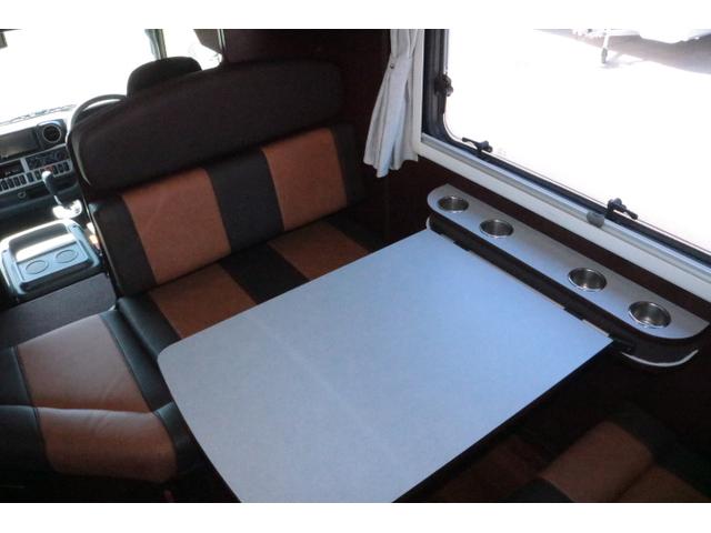 カムロード ナッツRVクレソンボヤージュエボライト トリプルサブバッテリー 家庭用エアコン 走行充電 FFヒーター 1500Wインバーター コンバーター 外部電源 ルーフベント ソーラーパネル1枚 冷蔵庫 電子レンジ 19インチテレビ サイドオーニング(9枚目)