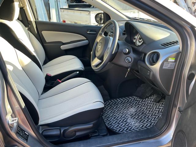 デミオ １３Ｃ　２ＷＤ　　　禁煙車　ＣＤ　５速ＭＴ　電動格納ドアミラー　集中ロック　パワステ　パワーウインドウ　ＡＢＳ（24枚目）