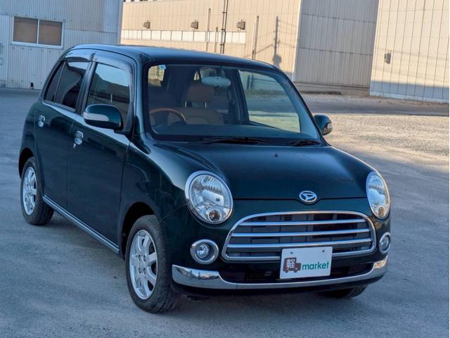 ミラジーノ プレミアムＸ　フロア４速ＡＴ　純正ＣＤオーディオ　オートエアコン　ＡＢＳ　キーレスエントリー　盗難警報装置　パワステ　パワーウィンドウ　Ｗエアバッグ　電動格納ミラー　純正アルミ（11枚目）