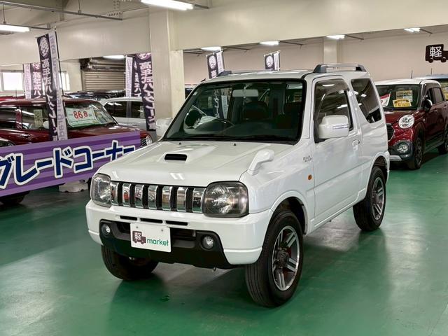 ジムニー ワイルドウインド 4WD ターボ車 フロア4速AT 社外7インチナビ D席シートヒーター ABS エアコン パワステ パワーウィンドウ Wエアバッグ 電動格納ミラー 純正アルミ(12枚目)