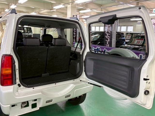 ジムニー ワイルドウインド 4WD ターボ車 フロア4速AT 社外7インチナビ D席シートヒーター ABS エアコン パワステ パワーウィンドウ Wエアバッグ 電動格納ミラー 純正アルミ(15枚目)