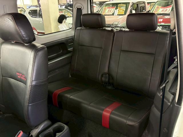 ジムニー ワイルドウインド 4WD ターボ車 フロア4速AT 社外7インチナビ D席シートヒーター ABS エアコン パワステ パワーウィンドウ Wエアバッグ 電動格納ミラー 純正アルミ(18枚目)