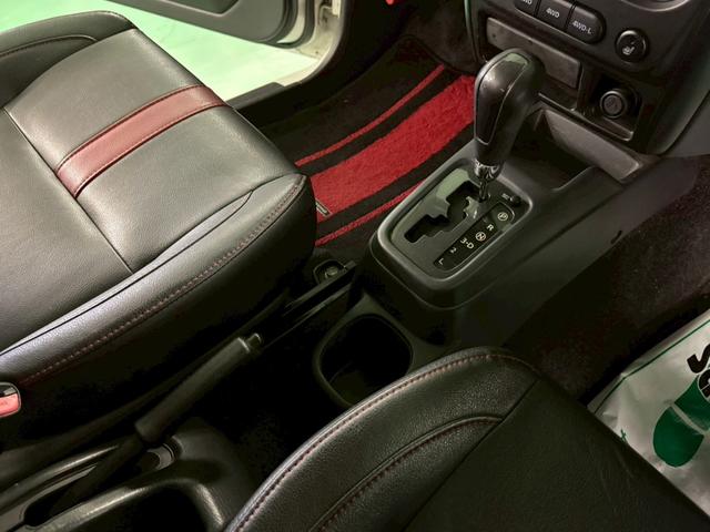 ジムニー ワイルドウインド 4WD ターボ車 フロア4速AT 社外7インチナビ D席シートヒーター ABS エアコン パワステ パワーウィンドウ Wエアバッグ 電動格納ミラー 純正アルミ(28枚目)